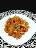 Pasta tiburón gratinada con guisantes
