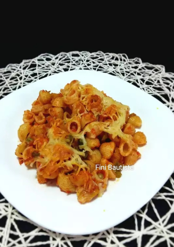 Una foto de Pasta tiburón gratinada con guisantes
