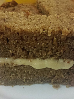A picture of Banana Bread with Cream Cheese Frosting.