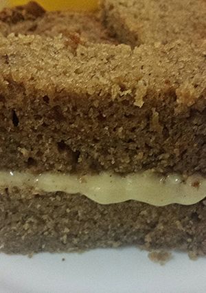 A picture of Banana Bread with Cream Cheese Frosting.