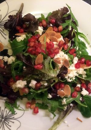 A picture of Pomegranate baby leaf rocket salad.