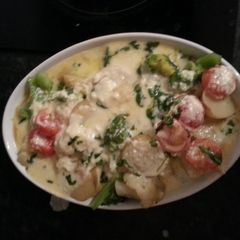 A picture of Potato, cauliflower, broccoli and cheese bake.