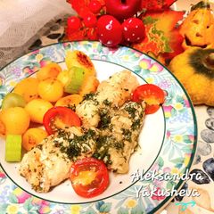 A picture of Hake in milky onion sauce.