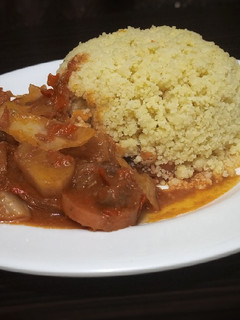 A picture of Cous cous with vegetables soup.