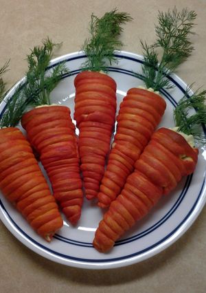 A picture of Easter Crescent Roll Carrots Filled With Egg Salad.