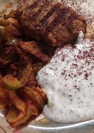 A picture of Koobideh with Veggies.
