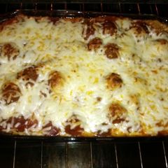 A picture of baked meatball spaghetti.