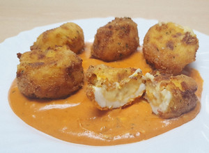 Foto principal de Huevos rellenos en salsa