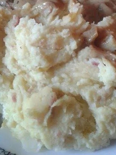A picture of mash potato with bacon and philadelphia!.