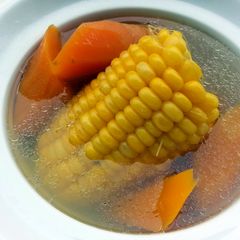 A picture of LG CHICKEN SOUP / STOCK( CARROT AND CORN COB ).