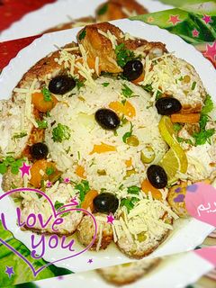 صورة لوصفة رولي الدجاج بالزيتون و الأرز