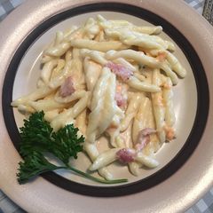 A picture of Bacon and three cheese carbonara with strozzapreti pasta.