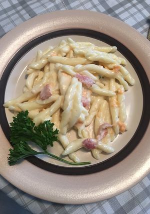 A picture of Bacon and three cheese carbonara with strozzapreti pasta.