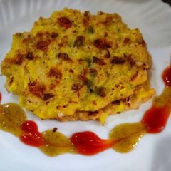 A picture of Sooji oats vegetable chilla.