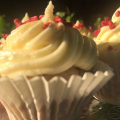 A picture of Banana muffins with banana butter cream icing #bakingcontest.