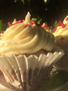 A picture of Banana muffins with banana butter cream icing #bakingcontest.