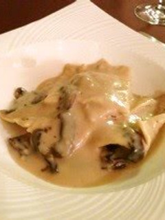 A picture of Porcini Mushroom Ravioli in Soy Milk Sauce.