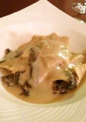 A picture of Porcini Mushroom Ravioli in Soy Milk Sauce.