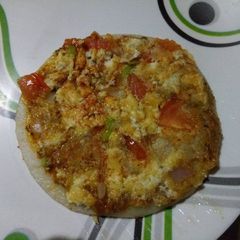 A picture of Pickle paneer uttapam.