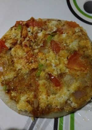 A picture of Pickle paneer uttapam.