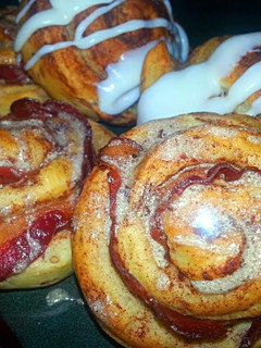 A picture of Bacon wrapped Cinnamon Rolls With maple mocha glaze.