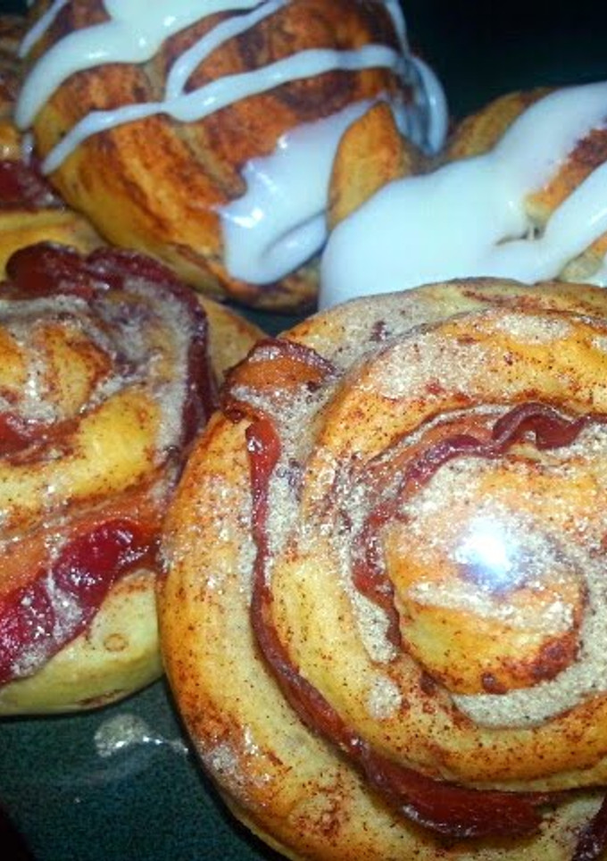 A picture of Bacon wrapped Cinnamon Rolls With maple mocha glaze.