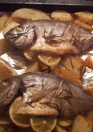 A picture of Sea bream with lemons.