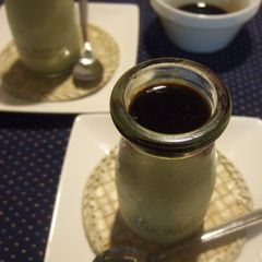 A picture of Matcha Pudding Served with Brown Sugar Syrup.