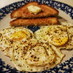 A picture of Over-easy Pucker Up Eggs.