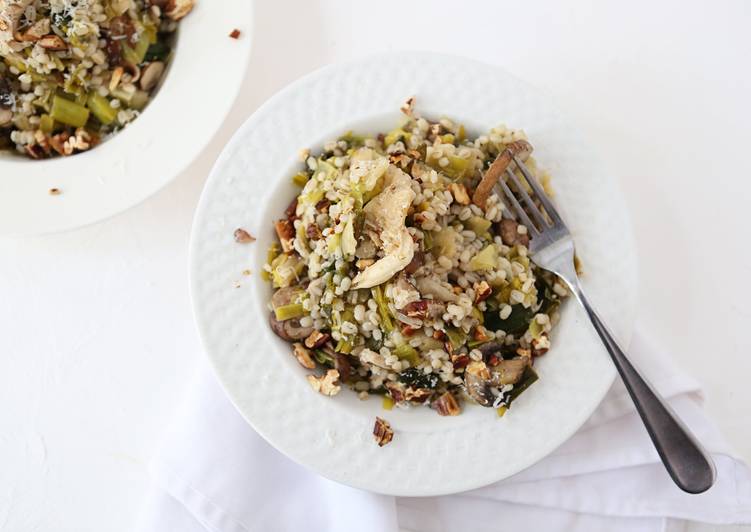 Toasted Barley Pilaf with Mixed Mushrooms and Leeks topped with Manchego Cheese and Toasted Walnuts
