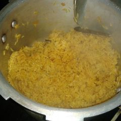 A picture of spiced turmeric pulao.