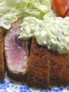 A picture of Fried Skipjack Tuna with Tartar Sauce.