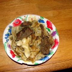 A picture of taisen's beef tips with red wine gravy.