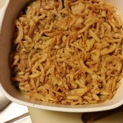 A picture of Spinach casserole with alfredo sauce.