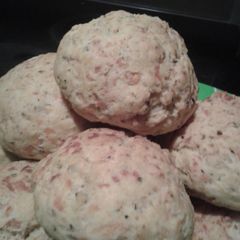 A picture of Cheese breads with basil.