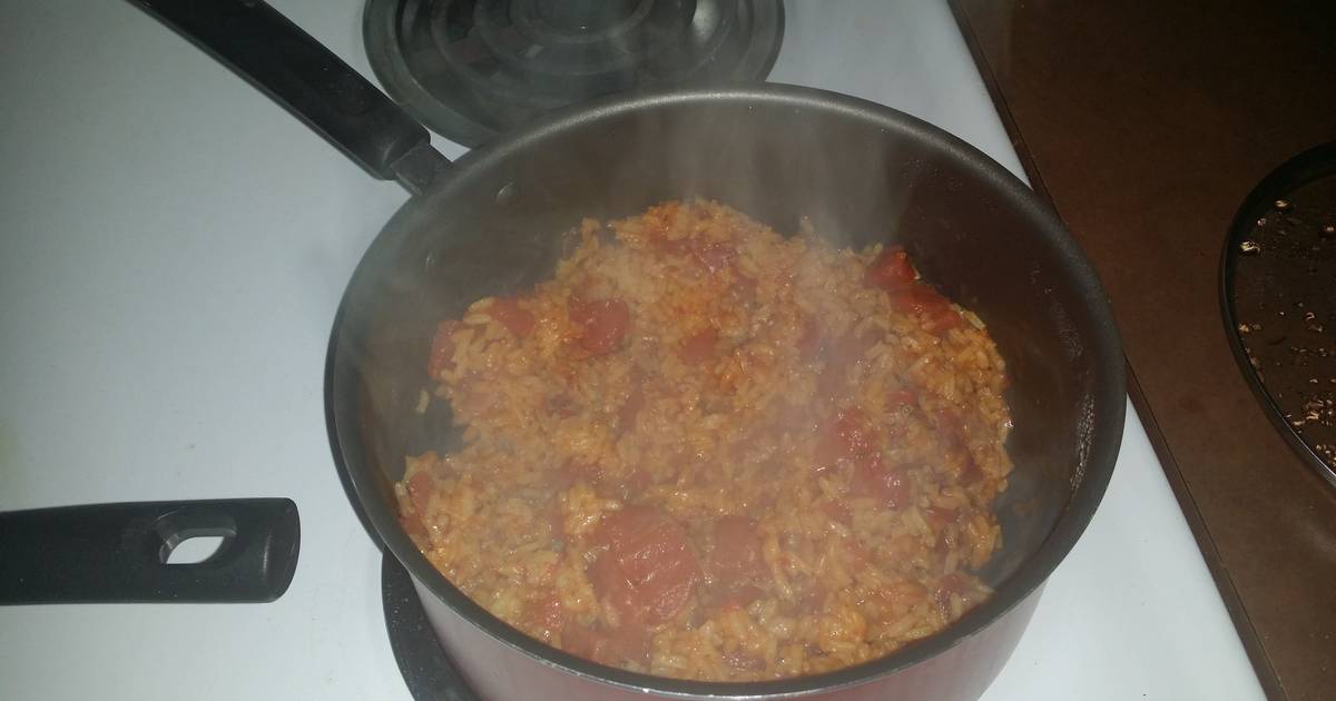 Spicy yellow rice with diced tomatoes Recipe by Anjelica Cookpad
