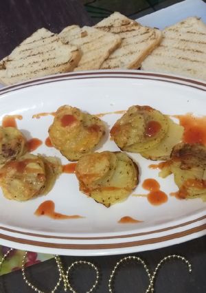 A picture of Potato stakes with grilled bread.