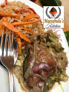 A picture of Vegetable rice and white chicken stew.