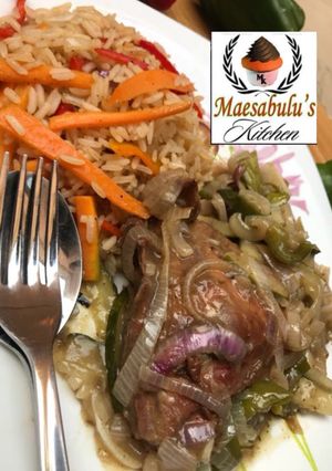 A picture of Vegetable rice and white chicken stew.