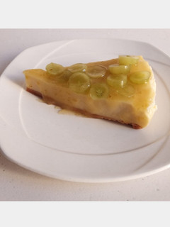 Una foto de Cheesecake con compota de uva