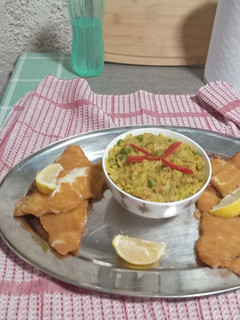 Una foto de Milanesa de Merluza con Crema de Queso.🐟