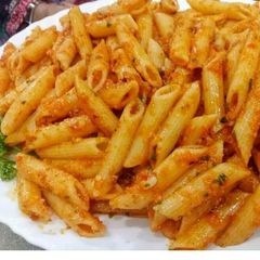 A picture of Red sauce pasta.