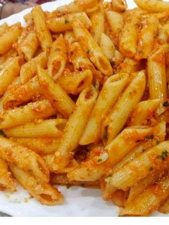 A picture of Red sauce pasta.