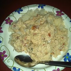 A picture of Shredded chicken and rice.