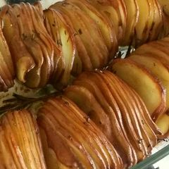 A picture of Vickys Sliced Rosemary & Garlic Butter Potatoes, GF DF EF SF NF.
