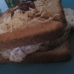 A picture of Chicken omlet cheese sandwich.