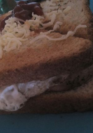 A picture of Chicken omlet cheese sandwich.