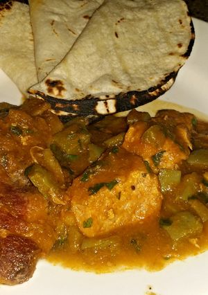 A picture of Nopales and pork stew.