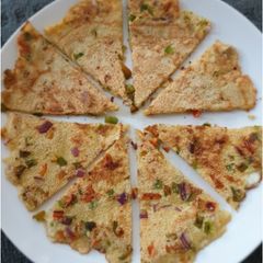 Egg Uttapam A picture of Egg Uttapam.