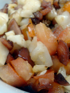 A picture of Fried Cabbage with sausage.